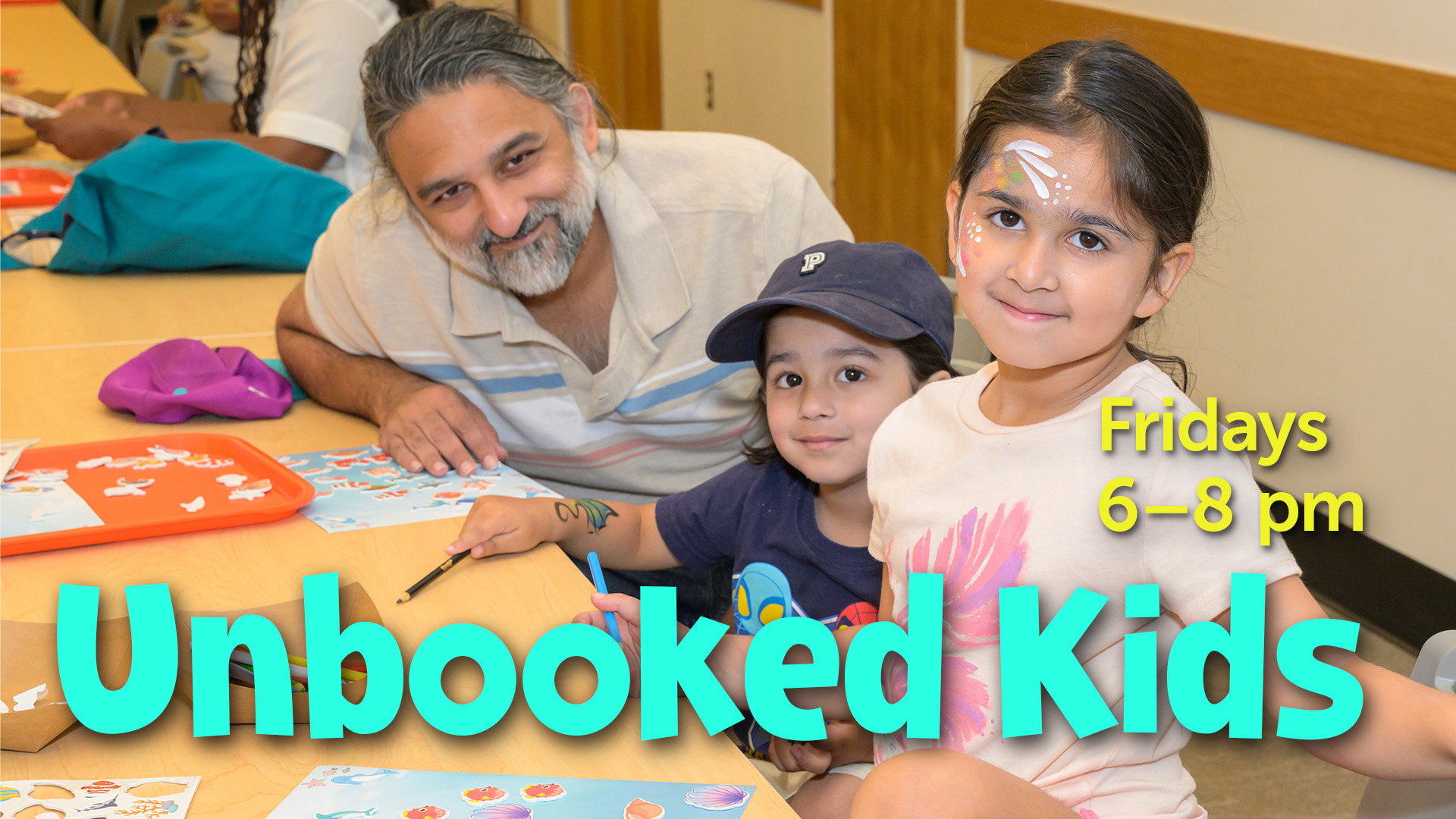two children with father at craft activity with event text