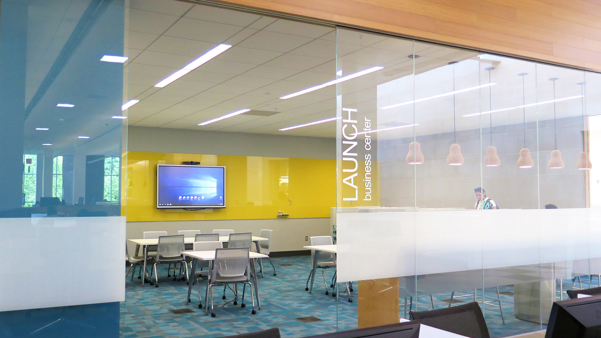 walk-in coworking space at the library, glass walls, Lauch business center