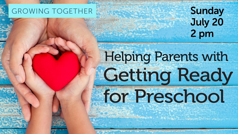 adult hands cradling child hands holding a paper heart, on blue wood background, with event text